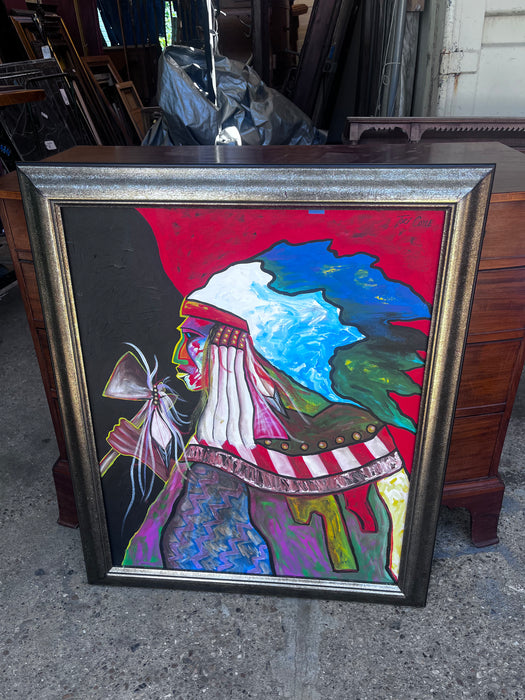 FRAMED COLORFUL OIL PAINTING OF AN INDIAN WITH A HATCHET SIGNED TERI COYLE