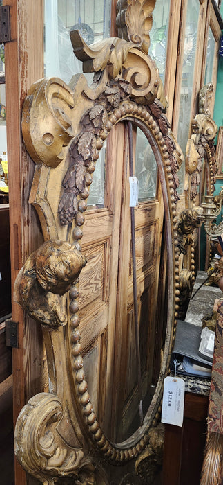 PAIR OF ORNATE GILT FRAMES WITH CHERUBEM SCROLLS AND SHALL PEDIMENTS