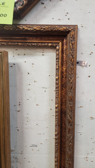 LARGE GOLD FRAME WITH LAURELING