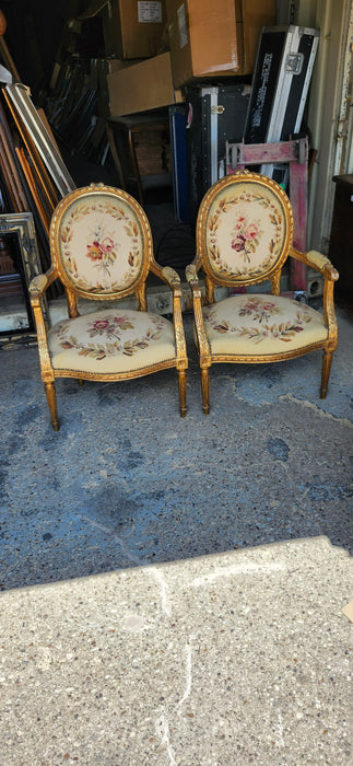 PAIR OF LOUIS XVI NEEDLEPOINT GILT FAUTEUILS (OPEN ARM CHAIRS}