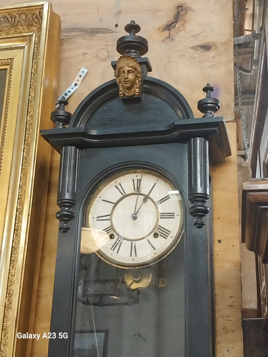 EBONIZED RENAISSANCE REVIVAL WALL CLOCK WITH FACE OF COLUMBIA