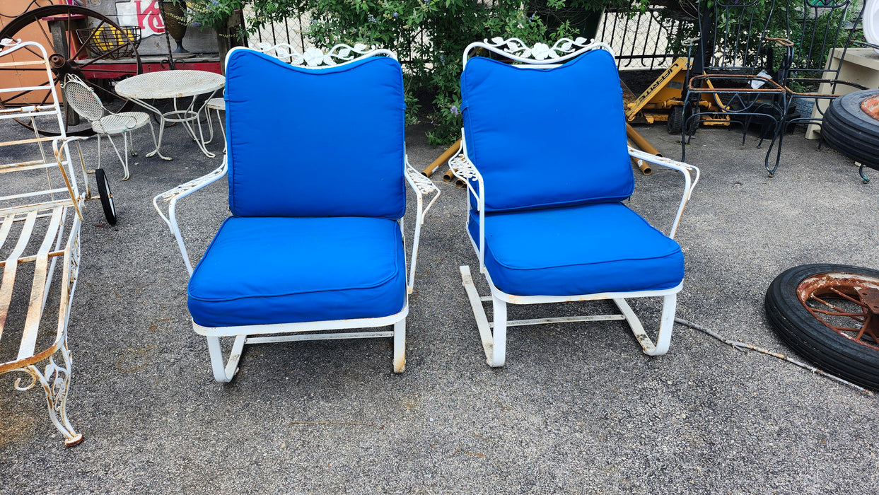 PAIR OF BOUNCY WHITE IRON WITH BLUE CUSHIONS PATIO CHAIRS