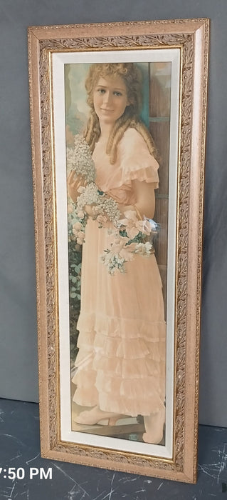 FRAMED VERTCAL PRINT OF A YOUNG WOMAN