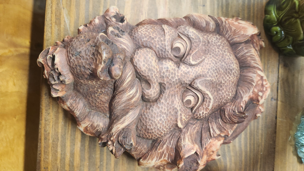 RUST COLORED CARVED ASIAN MAN