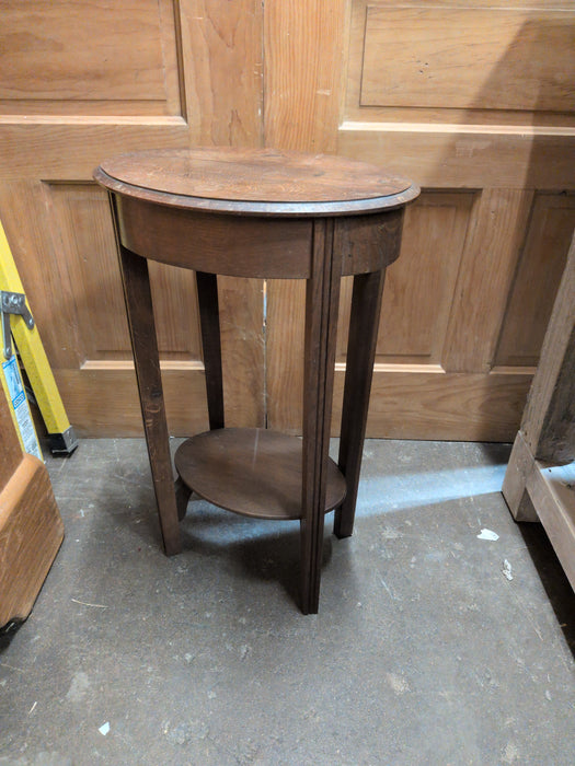 SMALL OVAL OAK STAND TABLE