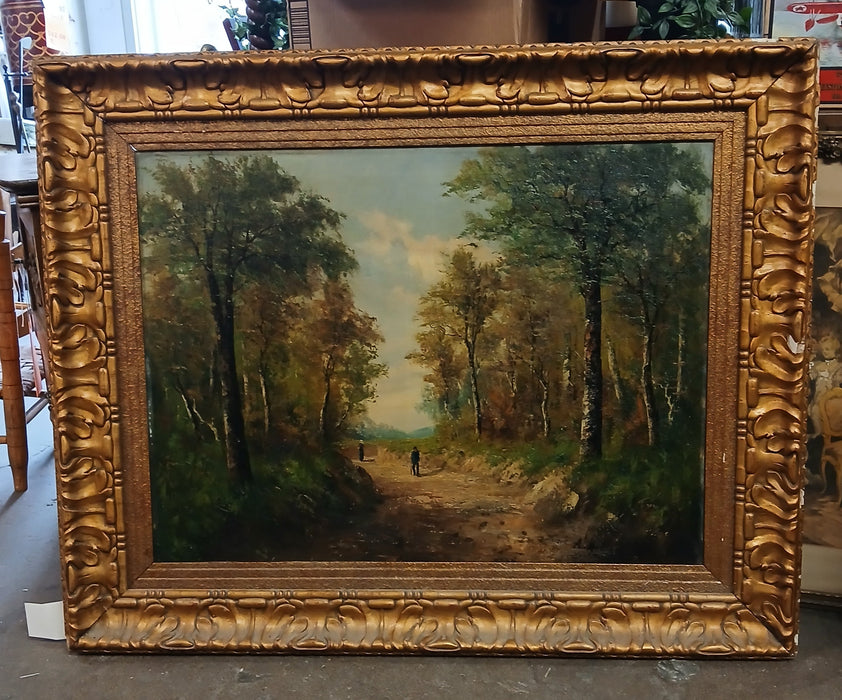 LARGE GILT FRAMED LANDSCAPE OIL PAINTING ON CANVAS OF 2 PEOPLE ON A FOREST PATH