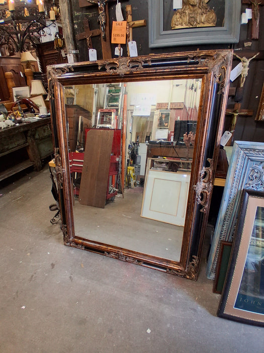 ORNATE BLACK AND GOLD MIRROR
