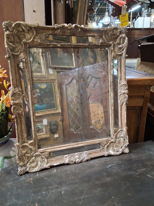EARLY SHABBY BUT ORNATE MIRROR