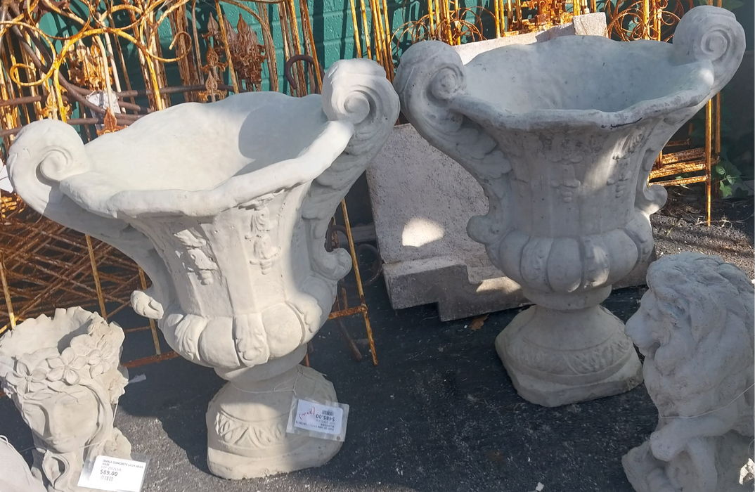 PAIR OF URN STYLE CONCRETE PLANTERS