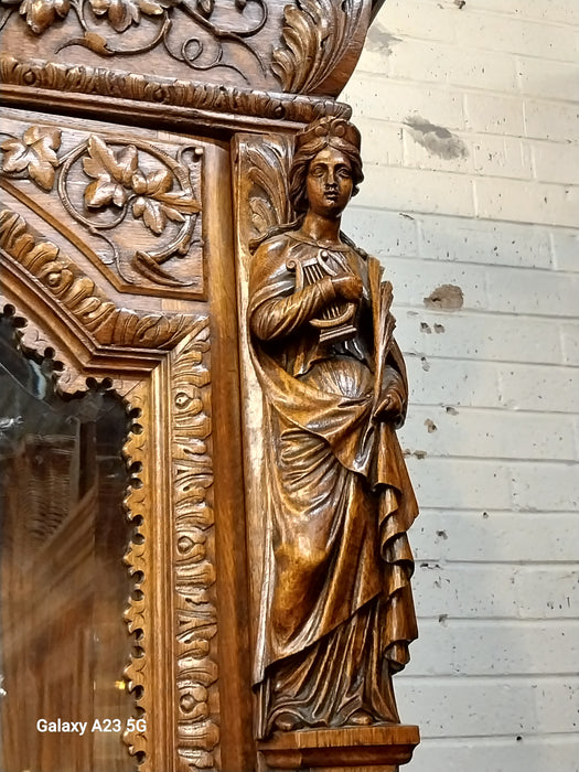 INCREDIBLE FRENCH FIGURAL CARVED SINGLE DOOR BOOKCASE