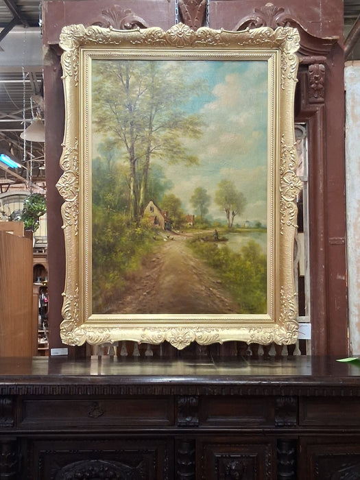 GILT FRAMED OIL PAINTING OF CHICKENS ALONG THE RIVER BANK AN A MAN IN A BOAT