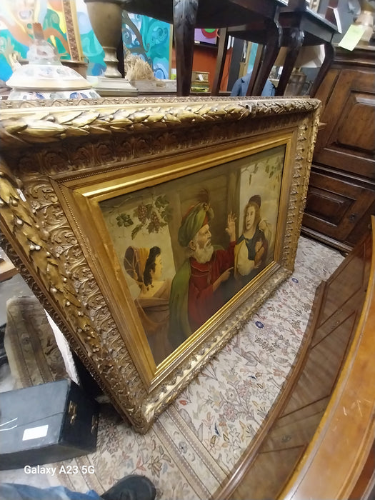 ORNATE GILT FRAMED OIL PAINITNG WITH BEARDED SAGE ADMONISHING MOTHER AND CHILD