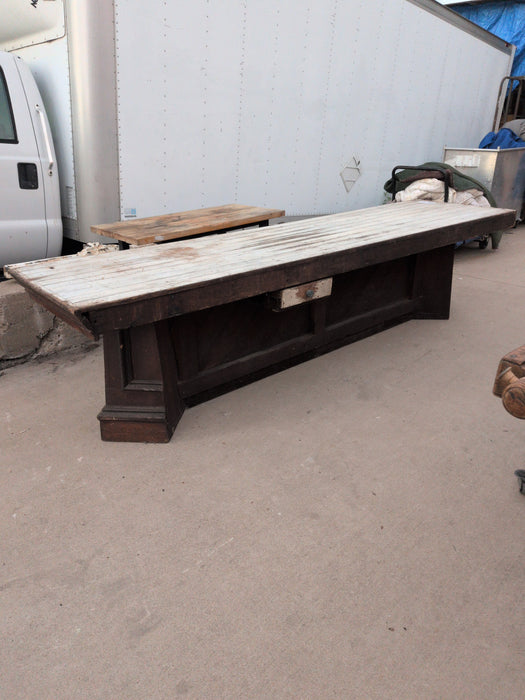 LONG WORK TABLE WITH WHITE TOP AND FANCY BASE