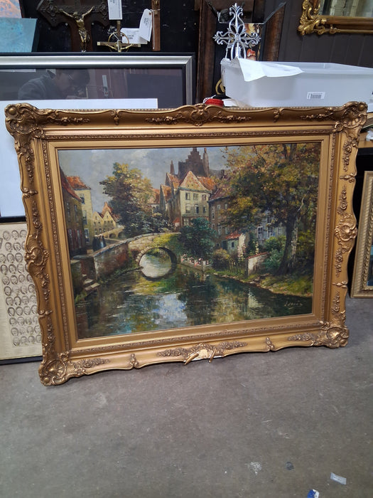 LARGE FRAMED OIL PAINTING OF A CANAL SCENE-AS FOUND
