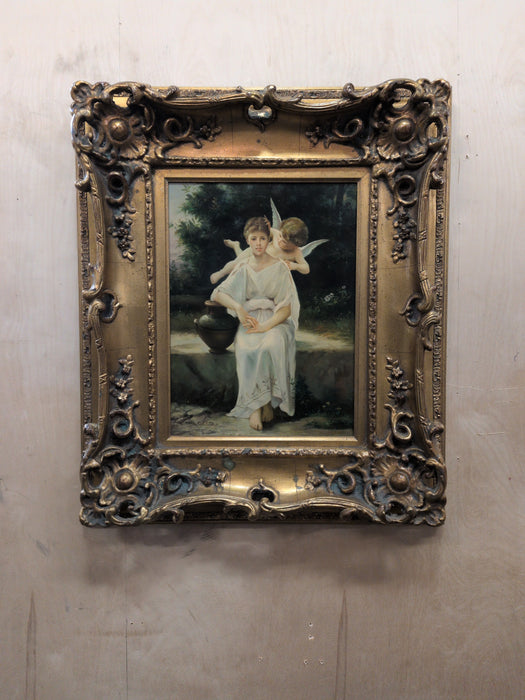 FRAMED PAINTING OF A WOMAN AND CHERUB ON BOARD