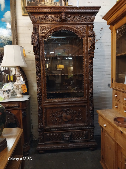 INCREDIBLE FRENCH FIGURAL CARVED SINGLE DOOR BOOKCASE
