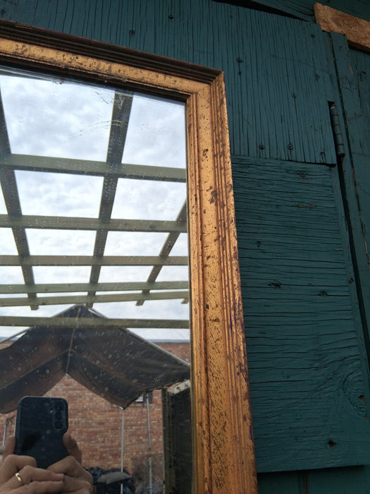 TALL GILT FRAMED MIRROR