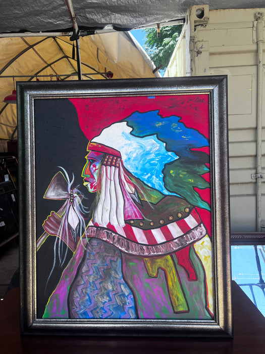 FRAMED COLORFUL OIL PAINTING OF AN INDIAN WITH A HATCHET SIGNED TERI COYLE