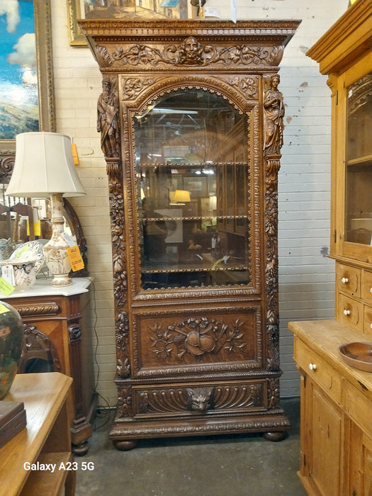 INCREDIBLE FRENCH FIGURAL CARVED SINGLE DOOR BOOKCASE