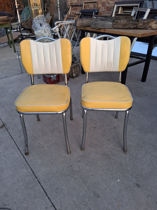 PAIR OF YELLOW UPHOLSTERED CHAIRS