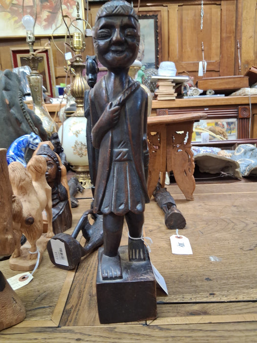 CARVED WOOD HIKER AS FOUND