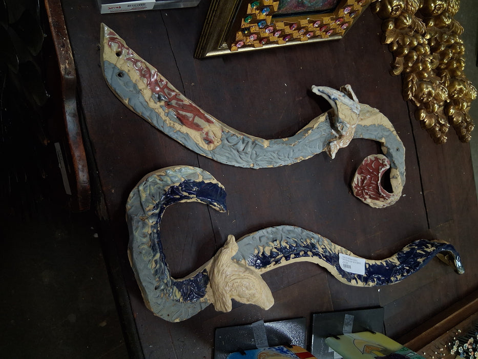 PAIR OF FREEFORM SCROLL POTTERY WALL ART WITH BIRDS