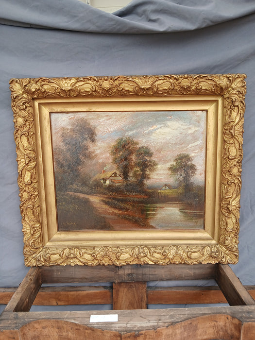 SMALL FRAMED LANDSCAPE OIL PAINTING WITH HOUSES