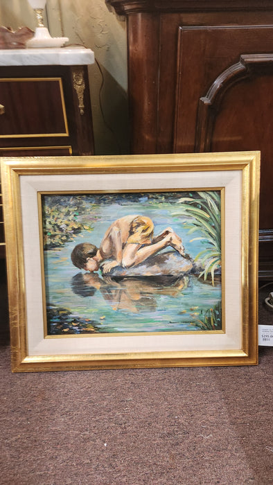 FRAMED OIL PAINTING OF A BOY DRINKING FROM A STREAM