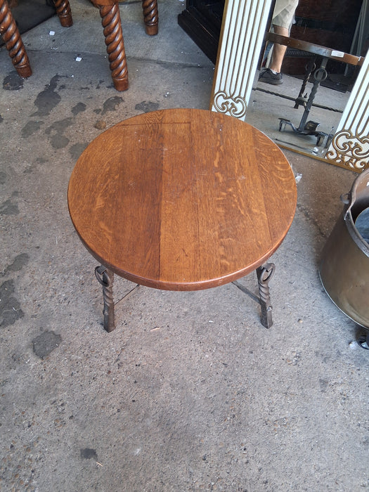 ROUND OAK COFFEE TABLE WITH IRON TWIST LEGS