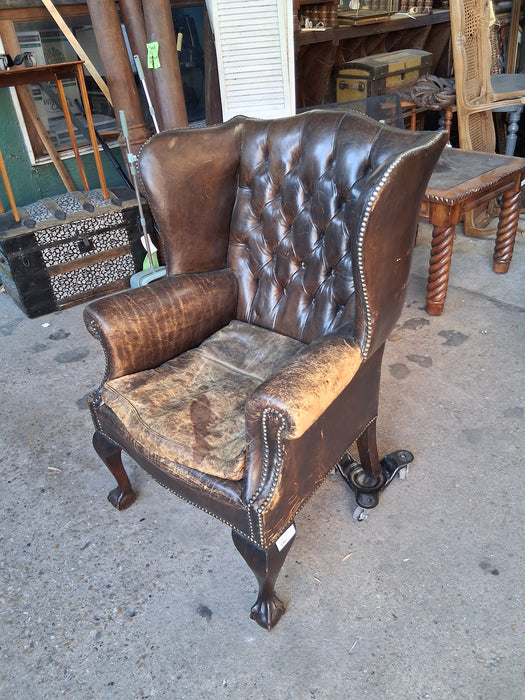 DISTRESSED LEATHER WINGBACK CHIPPENDALE CHAIR