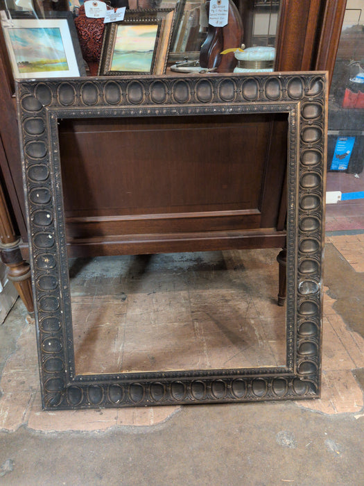 CARVED WOOD FRAME WITH CIRCLES