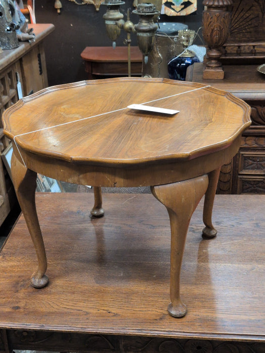 LOW ROUND WALNUT SIDE TABLE WITH SHAPED EDGE