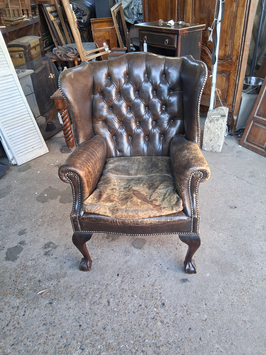 DISTRESSED LEATHER WINGBACK CHIPPENDALE CHAIR