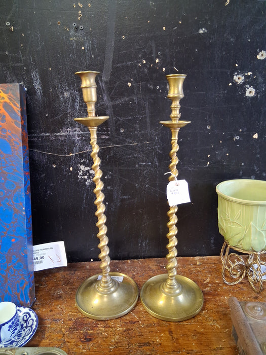 PAIR OF TALL BRASS BARLEY TWIST CANDLE STANDS