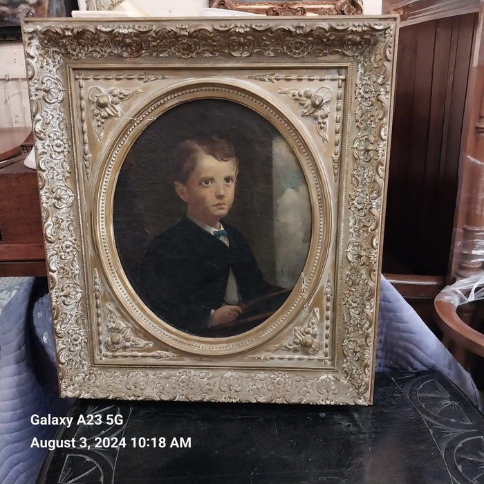 GILT FRAMED OIL PAINTING OF A BOY-RELINED CANVAS