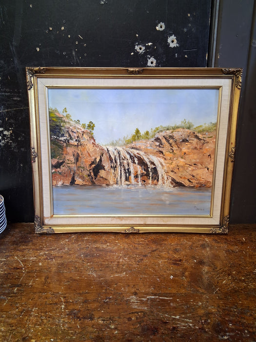 SMALL GILT FRAMED OIL PAINTING OF A WATER FALL