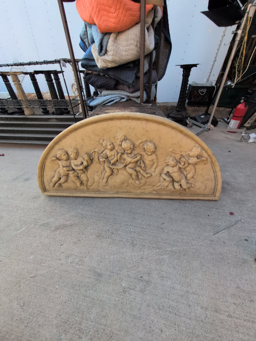 DECORATIVE ARCHED CHERUB RELIEF