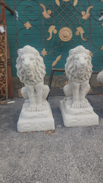 PAIR OF MEDIUM  CROUCHING CONCRETE LIONS