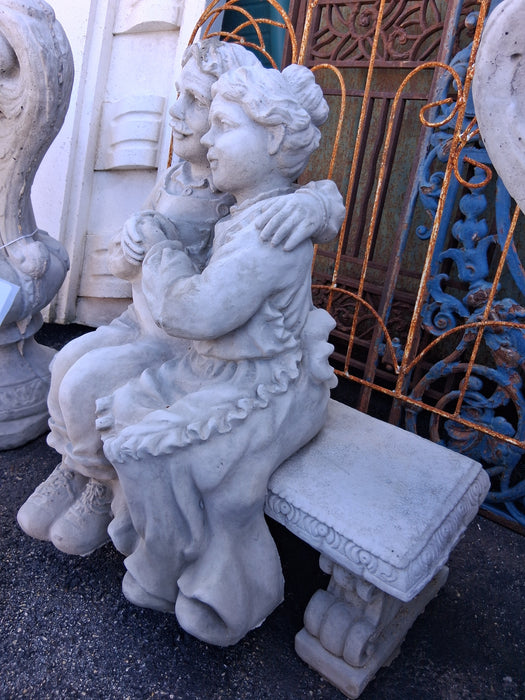 CONCRETE OLD PEOPLE ON A BENCH