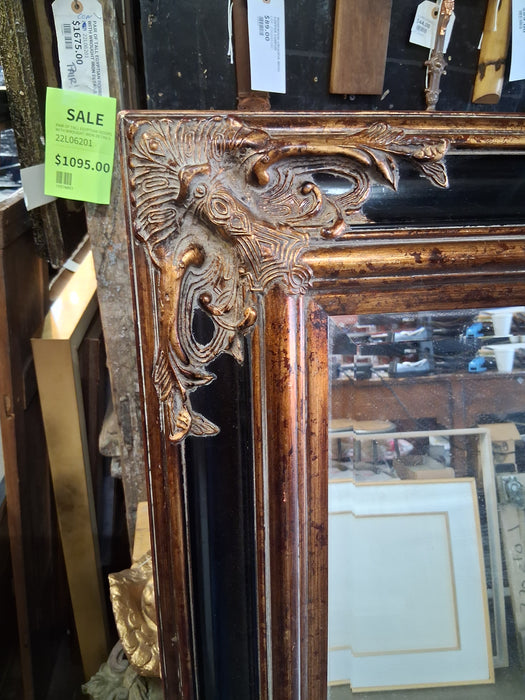 ORNATE BLACK AND GOLD MIRROR