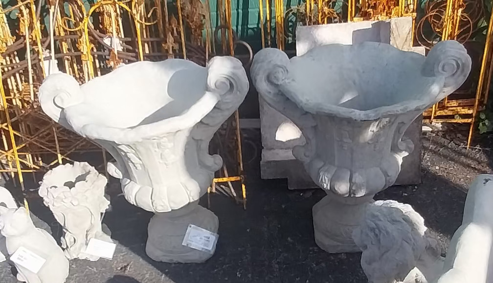 PAIR OF URN STYLE CONCRETE PLANTERS
