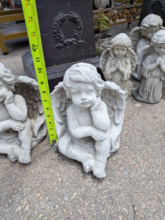 PAIR OF SMALL CONCRETE ANGELS REFLECTING