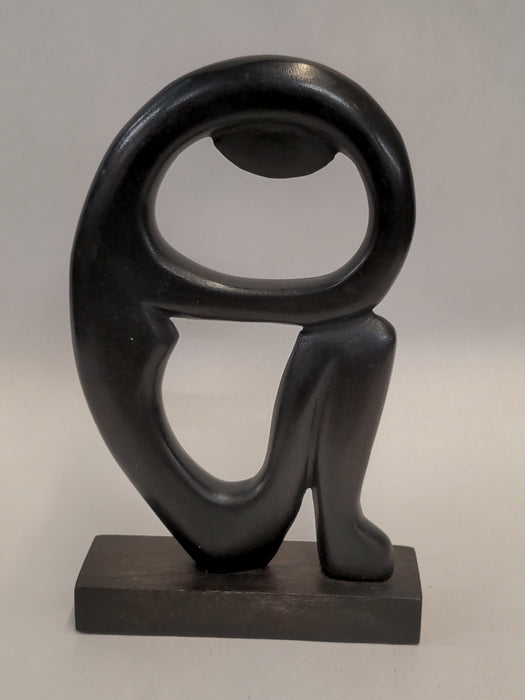 WOOD EBONIZED SITTING AFRICAN FIGURE