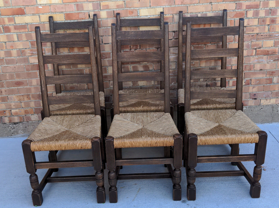 SET OF SIX RUSTIC OAK LADDER BACK CHAIRS WITH RUSH SEATS