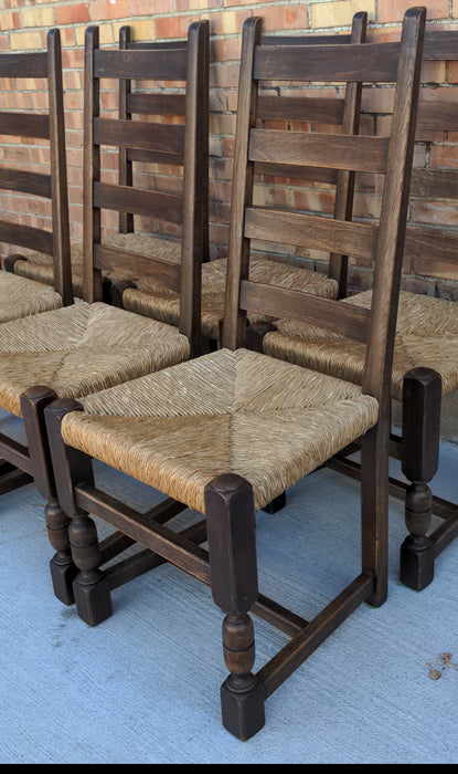 SET OF SIX RUSTIC OAK LADDER BACK CHAIRS WITH RUSH SEATS