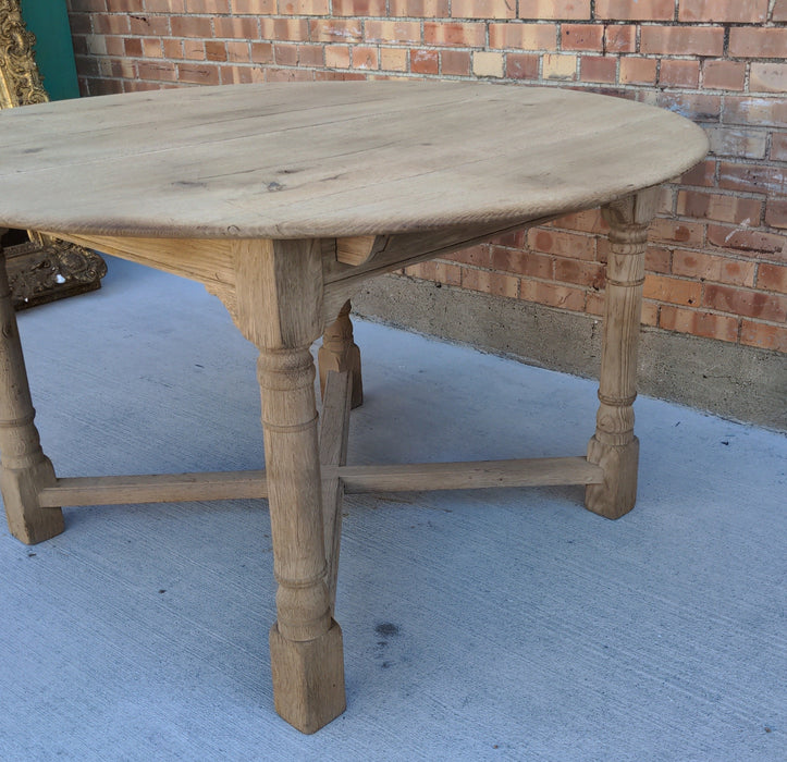 RUSTIC RAW OAK ROUND TABLE WITH TWO LEAVES