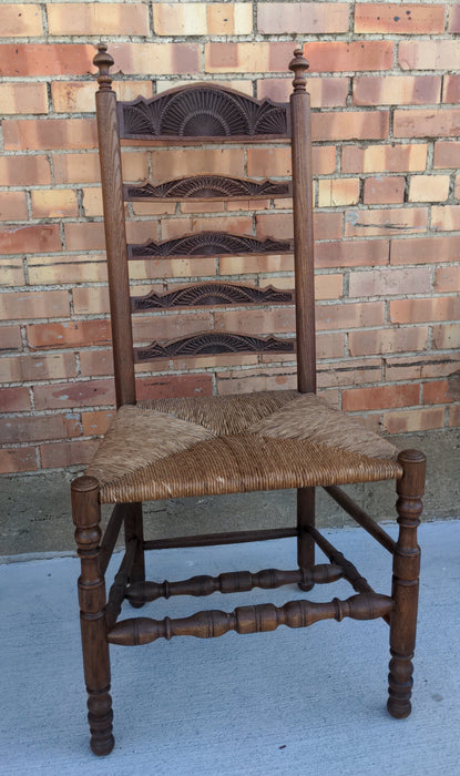 CHIP CARVED LADDER BACK OAK SIDE CHAIR WITH RUSH SEAT