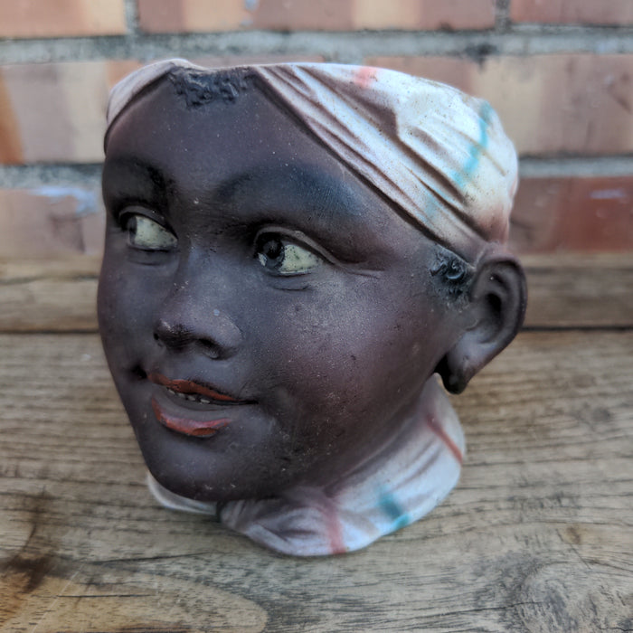 BLACK MEMORABILIA HEAD VASE AS FOUND