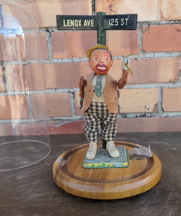 WIND UP TAP DANCER WITH KEY-UNDER GLASS