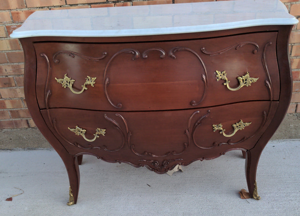 MAHOGANY BOMBE CHEST WITH MARBLE TOP AND ORMOLU